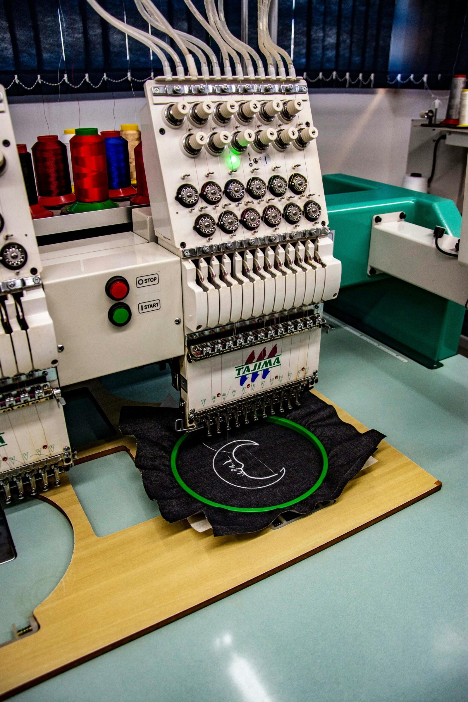 Borduurmachine voor bedrijfskleding